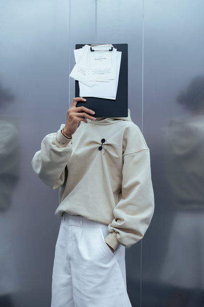 DOCUMENT COVER BUTTER HOODIE