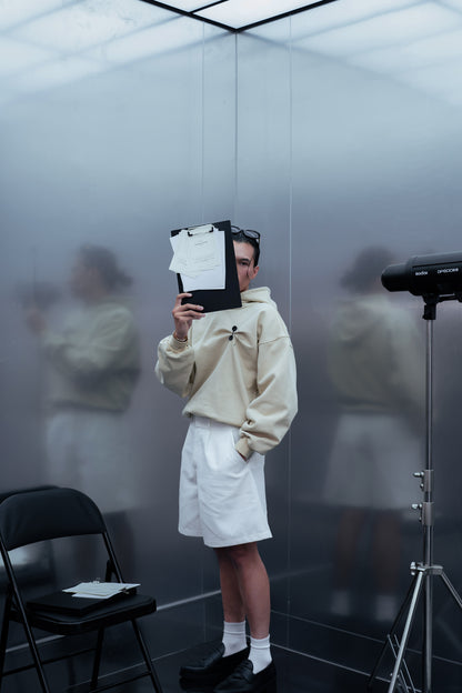 DOCUMENT COVER BUTTER HOODIE