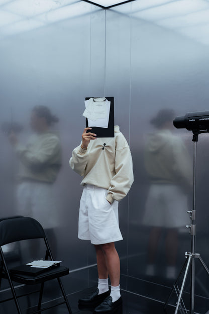 DOCUMENT COVER BUTTER HOODIE