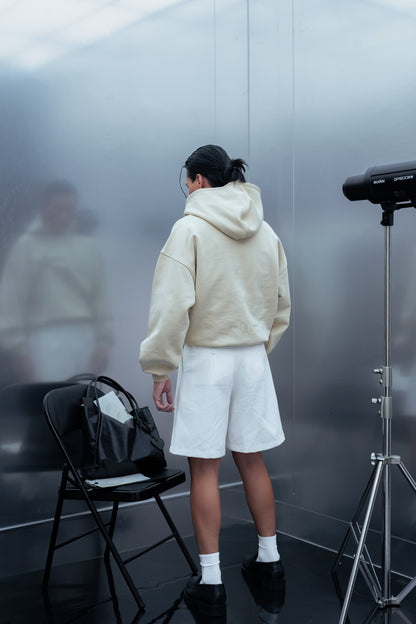 DOCUMENT COVER BUTTER HOODIE